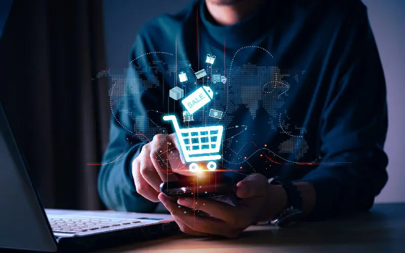 Online shopping concept with digital cart.