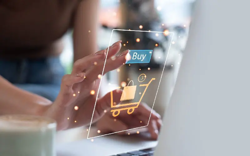 Hand interacting with virtual shopping cart interface.