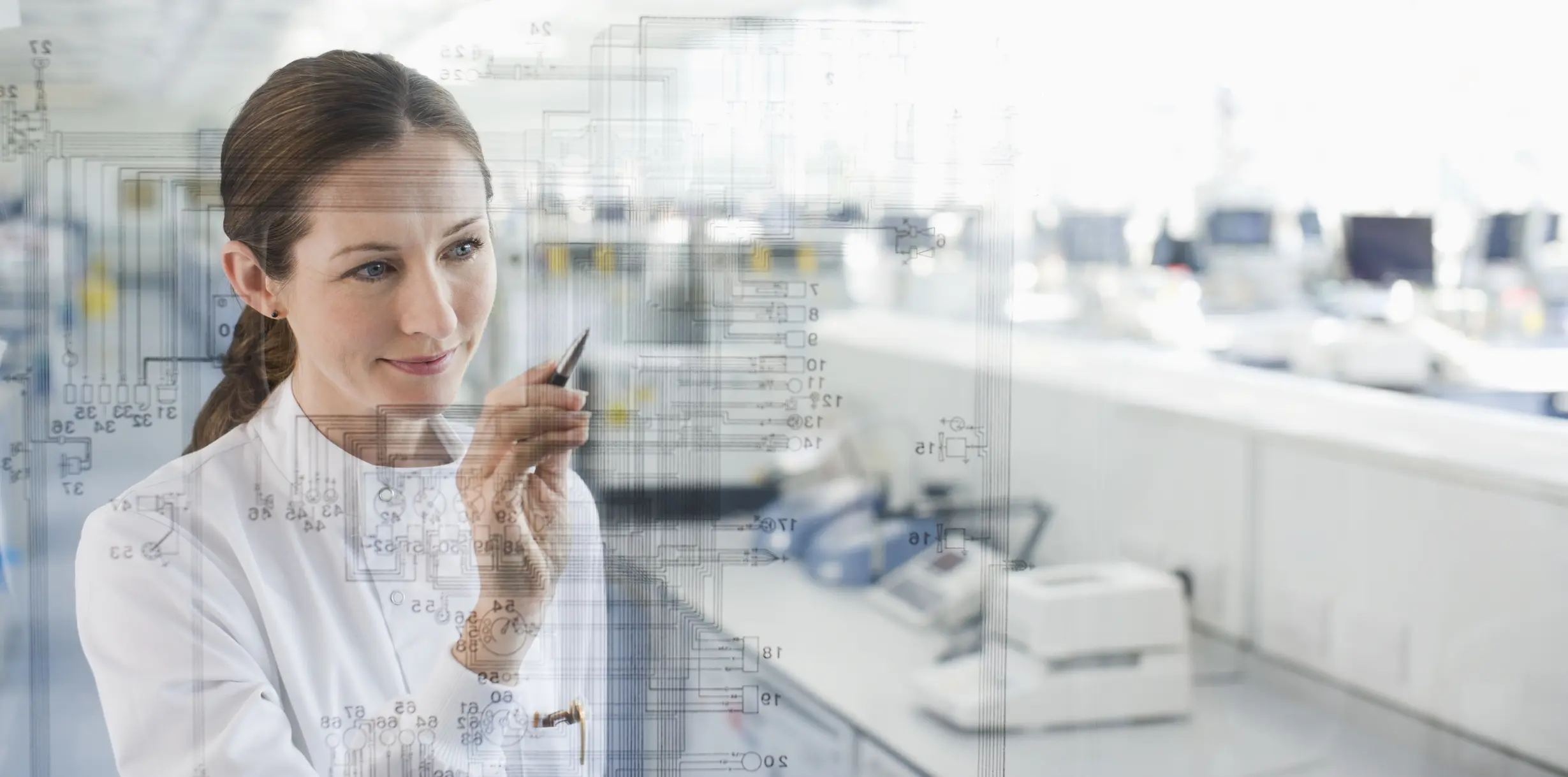 Scientist using touch screen in lab
