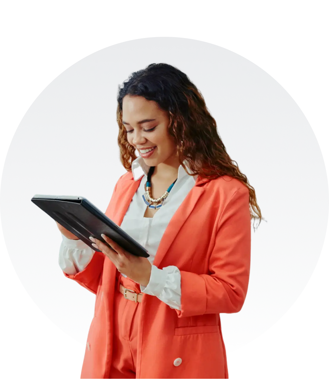 Person in orange suit using a tablet.